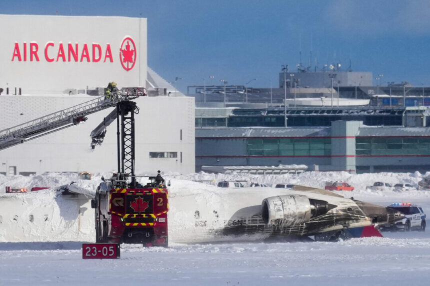 live-now:-morning-scenes-of-wreckage-of-passenger-jet-at-toronto-airport