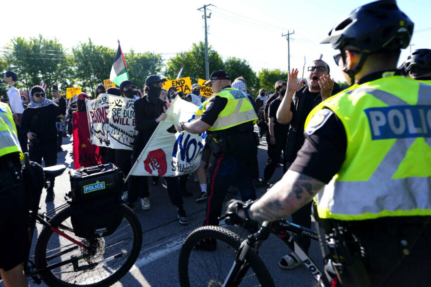 ottawa-police-arrest-11-for-mischief,-assaulting-officers-in-protest-of-defence-trade-show